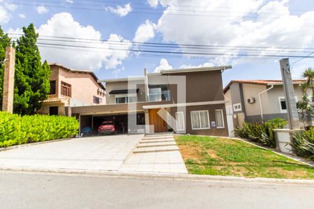 Casa de condomínio à venda com 554m², 4 quartos e 4 vagas Casa de condomínio à venda com 554m², 4 quartos e 4 vagasGaragem