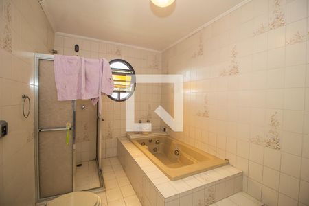 Casa à venda com 347m², 4 quartos e 2 vagasBanheiro da Suite