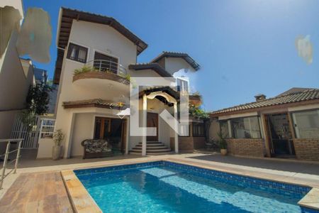 Casa de condomínio à venda com 410m², 4 quartos e 6 vagas