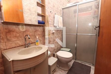 Casa à venda com 330m², 4 quartos e 6 vagasBanheiro Casa 1