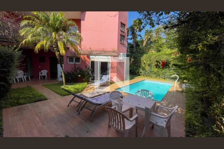 Casa de condomínio à venda com 445m², 4 quartos e 4 vagas