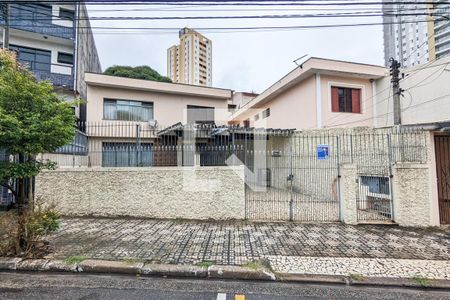 Casa à venda com 265m², 4 quartos e 4 vagas Casa à venda com 265m², 4 quartos e 4 vagasFachada