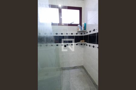 Casa à venda com 331m², 4 quartos e 4 vagasBanheiro Suite 2