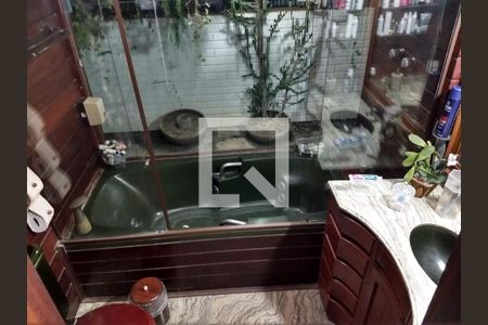 Casa à venda com 390m², 4 quartos e 4 vagasBanheiro