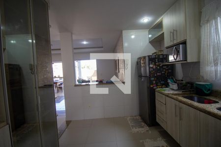 Casa de condomínio para alugar com 250m², 4 quartos e 2 vagas Casa de condomínio para alugar com 250m², 4 quartos e 2 vagasCozinha e Área de Serviço