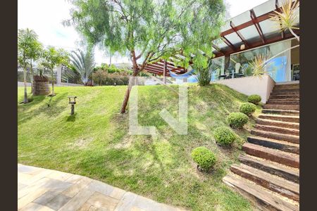 Casa de condomínio à venda com 290m², 4 quartos e 4 vagas Casa de condomínio à venda com 290m², 4 quartos e 4 vagasFachada -jardim