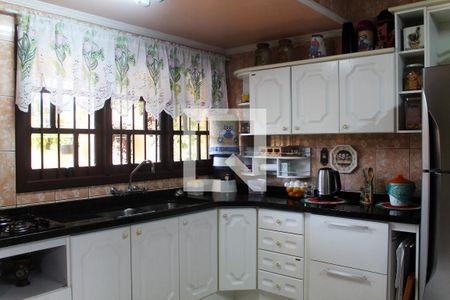 Casa à venda com 340m², 4 quartos e 4 vagas Casa à venda com 340m², 4 quartos e 4 vagasCozinha