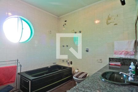 Casa à venda com 310m², 4 quartos e 2 vagas Casa à venda com 310m², 4 quartos e 2 vagasBanheiro da Suíte