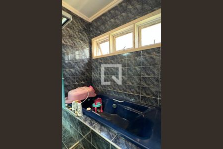 Casa de condomínio à venda com 350m², 4 quartos e 5 vagasBanheiro da Suíte 1