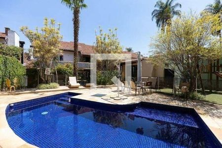 Casa de condomínio à venda com 330m², 5 quartos e 7 vagas