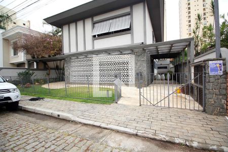 Casa à venda com 460m², 4 quartos e 4 vagas Casa à venda com 460m², 4 quartos e 4 vagasFachada