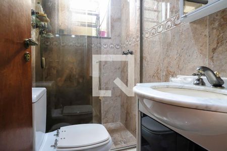 Casa à venda com 257m², 4 quartos e 3 vagasBanheiro suíte 2 casa 1