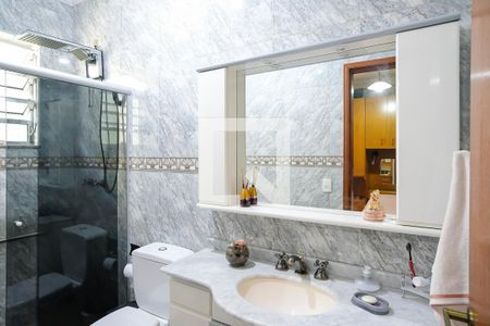 Casa à venda com 257m², 4 quartos e 3 vagasBanheiro suíte 1 casa 1