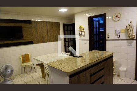 Casa de condomínio para alugar com 460m², 4 quartos e 2 vagasCozinha