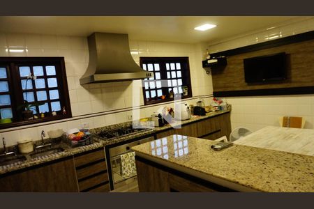 Casa de condomínio para alugar com 460m², 4 quartos e 2 vagasCozinha