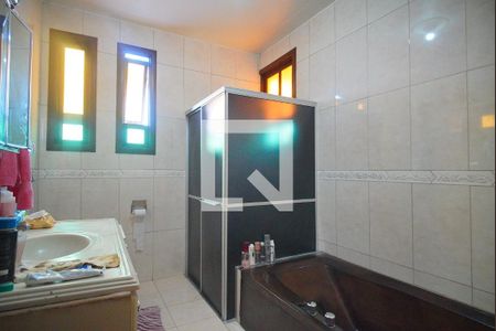 Casa à venda com 450m², 4 quartos e 5 vagas Casa à venda com 450m², 4 quartos e 5 vagasBanheiro da Suíte 2