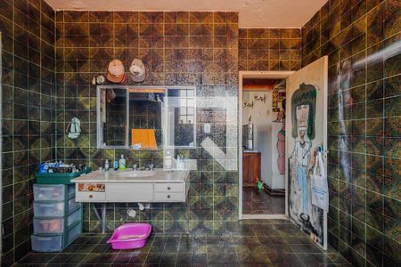 Casa à venda com 690m², 4 quartos e 5 vagasBanheiro da Suíte