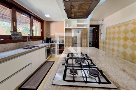Casa de condomínio à venda com 480m², 6 quartos e 4 vagas Casa de condomínio à venda com 480m², 6 quartos e 4 vagasCozinha