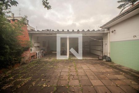 Casa à venda com 411m², 5 quartos e 4 vagas Casa à venda com 411m², 5 quartos e 4 vagasGaragem