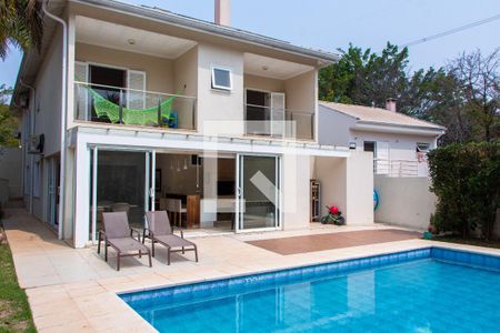 Casa de condomínio à venda com 384m², 4 quartos e 4 vagas Casa de condomínio à venda com 384m², 4 quartos e 4 vagasÁREA EXTERNA FUNDOS