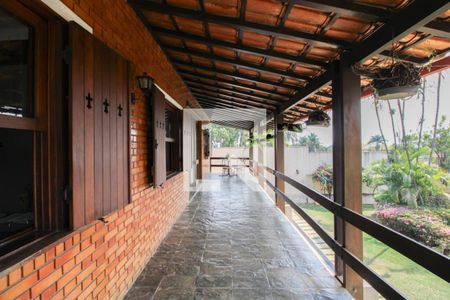 Casa à venda com 379m², 4 quartos e 4 vagas Casa à venda com 379m², 4 quartos e 4 vagasVaranda da Sala de TV