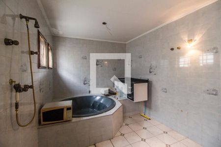 Casa de condomínio para alugar com 440m², 4 quartos e 4 vagas Casa de condomínio para alugar com 440m², 4 quartos e 4 vagasBanheiro da Suíte 1