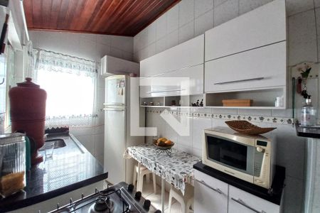 Casa à venda com 95m², 4 quartos e 4 vagas Casa à venda com 95m², 4 quartos e 4 vagasCozinha