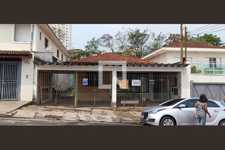 Casa à venda com 250m², 3 quartos e 3 vagas Casa à venda com 250m², 3 quartos e 3 vagasFachada