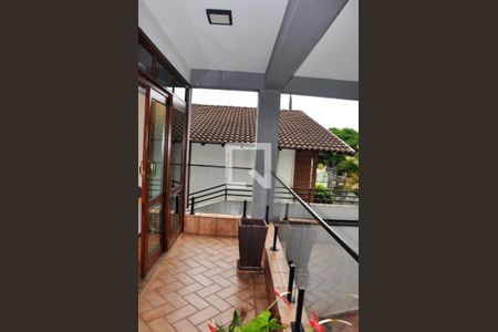 Casa à venda com 570m², 5 quartos e 6 vagasDetalhe - Varanda da Sala