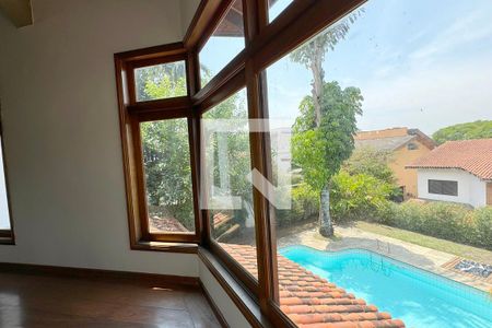 Casa de condomínio à venda com 720m², 3 quartos e 6 vagasSala de TV