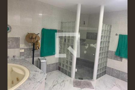 Casa de condomínio à venda com 411m², 4 quartos e 2 vagas