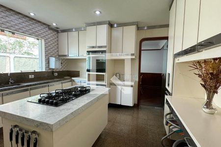 Casa de condomínio para alugar com 486m², 4 quartos e 8 vagasCozinha