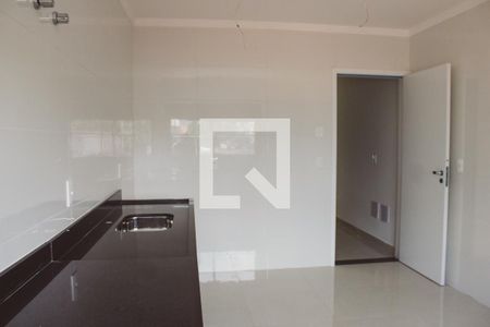 Casa à venda com 140m², 3 quartos e 2 vagas Casa à venda com 140m², 3 quartos e 2 vagasCozinha e Área de Serviço