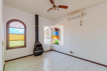 Sala de casa para alugar com 4 quartos, 163m² em Guarujá, Porto Alegre