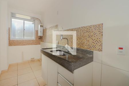 Apartamento à venda com 48m², 2 quartos e 1 vaga Apartamento à venda com 48m², 2 quartos e 1 vagaCozinha e Área de Serviço