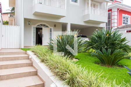 Casa de condomínio à venda com 394m², 4 quartos e 5 vagasÁREA EXTERNA FRENTE