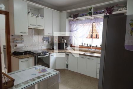 Casa à venda com 220m², 4 quartos e 4 vagas Casa à venda com 220m², 4 quartos e 4 vagasCozinha