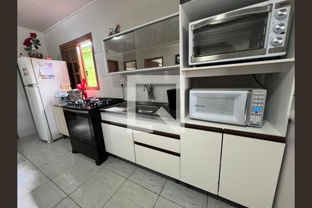 Casa à venda com 84m², 3 quartos e 2 vagas Casa à venda com 84m², 3 quartos e 2 vagasCozinha