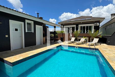 Casa de condomínio à venda com 403m², 4 quartos e 4 vagasPiscina