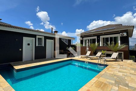 Casa de condomínio à venda com 403m², 4 quartos e 4 vagasPiscina