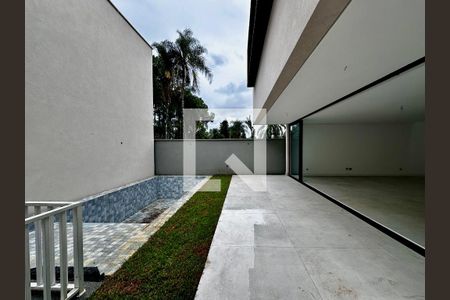 Casa de condomínio à venda com 486m², 4 quartos e 4 vagasVaranda/Quintal