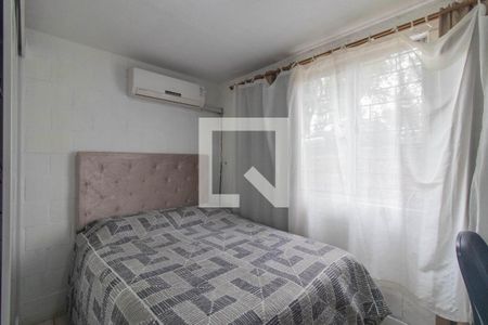 Quarto 1 de apartamento para alugar com 2 quartos, 48m² em Vila Nova, Porto Alegre