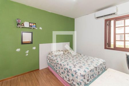 Quarto 2 de casa de condomínio à venda com 2 quartos, 56m² em Vila Nova, Porto Alegre