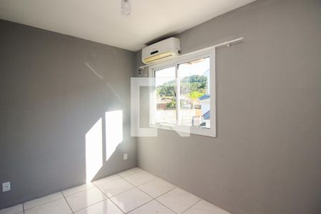Quarto 1 de casa de condomínio para alugar com 2 quartos, 62m² em Hípica, Porto Alegre
