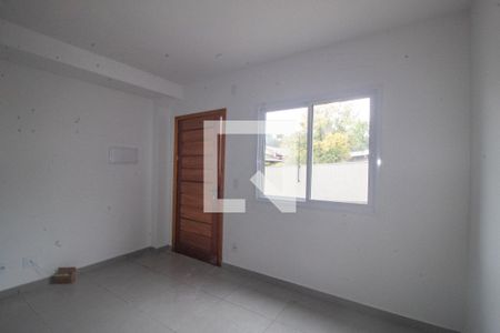 Sala de casa de condomínio para alugar com 2 quartos, 60m² em Vila Nova, Porto Alegre