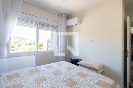 Quarto 1 de apartamento para alugar com 2 quartos, 62m² em Partenon, Porto Alegre