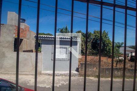 Vista de casa à venda com 4 quartos, 134m² em Vila Nova, Porto Alegre