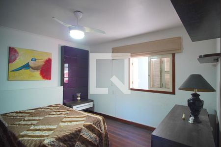 Suíte de casa à venda com 6 quartos, 502m² em Chácara das Pedras, Porto Alegre