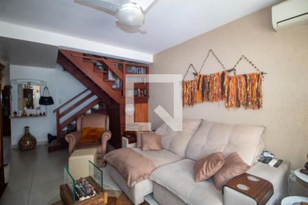 Sala de casa de condomínio para alugar com 3 quartos, 180m² em Guarujá, Porto Alegre