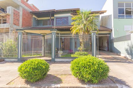 Casa à venda com 310m², 4 quartos e 4 vagas Casa à venda com 310m², 4 quartos e 4 vagasFachada vista da Rua